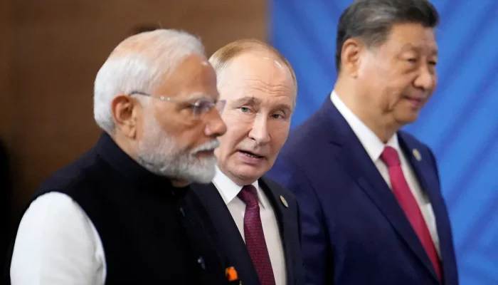 Narendra Modi, Vladimir Putin e Xi Jinping em Kazan, na Rússia 23/10/2024 Alexander Zemlianichenko/Pool via REUTERS  • Reuters